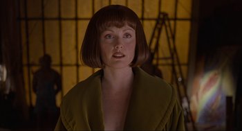 Movie still from “The Big Lebowski” (1998), directed by Ethan Coen – A person wearing a green jacket; Close Up shot, Low angle