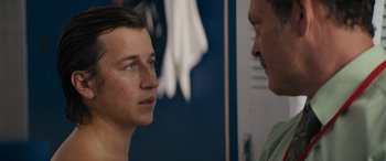 Movie still from “The Binge” (2020), directed by Jeremy Garelick – A young man and an older man face to face; Close Up shot, Over the shoulder angle