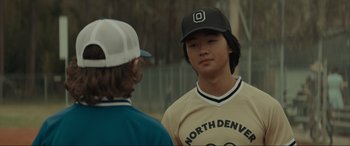 Movie still from “The Black Phone” (2021), directed by Scott Derrickson – Two young baseball players talking to each other; Close Up shot, Over the shoulder angle