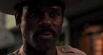 Movie still from “The Blues Brothers” (1980), directed by John Landis – A person wearing a hat; Close Up shot, Low angle