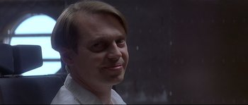 Movie still from “Con Air” (1997), directed by Simon West – A person with a beard; Close Up shot, Low angle