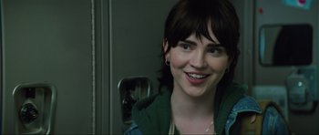 Movie still from “The Boogeyman” (2023), directed by Rob Savage – A person smiling for the camera; Close Up shot, Over the shoulder angle