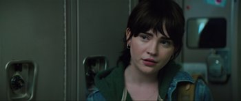 Movie still from “The Boogeyman” (2023), directed by Rob Savage – A person wearing a green jacket; Close Up shot, Over the shoulder angle