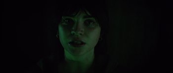 Movie still from “The Boogeyman” (2023), directed by Rob Savage – A woman's face in the dark; Close Up shot, Low angle