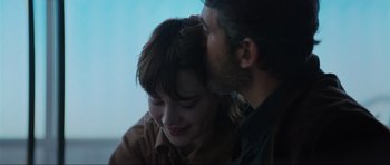 Movie still from “The Boogeyman” (2023), directed by Rob Savage – A man and a woman sitting next to each other; Close Up shot, Over the shoulder angle