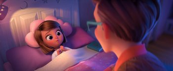 Movie still from “The Boss Baby 2: Family Business” (2021), directed by Tom McGrath – A woman looking into a mirror while a child looks at her; Medium shot, High angle