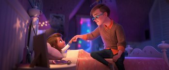 Movie still from “The Boss Baby 2: Family Business” (2021), directed by Tom McGrath – A boy and a girl sitting on a bed; Wide shot, Over the shoulder angle