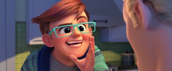 Movie still from “The Boss Baby 2: Family Business” (2021), directed by Tom McGrath – A cartoon of a man with glasses smiling; Close Up shot, Over the shoulder angle