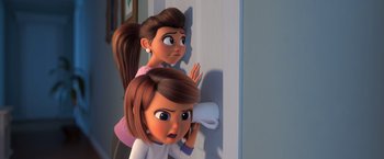 Movie still from “The Boss Baby 2: Family Business” (2021), directed by Tom McGrath – Two animated women are standing next to a wall; Close Up shot, Over the shoulder angle