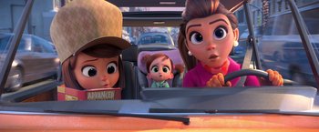 Movie still from “The Boss Baby 2: Family Business” (2021), directed by Tom McGrath – A group of people sitting in a car with a child; Close Up shot, Over the shoulder angle