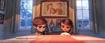 Movie still from “The Boss Baby 2: Family Business” (2021), directed by Tom McGrath – A couple of people sitting at a table; Medium shot, Over the shoulder angle