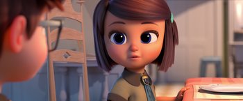 Movie still from “The Boss Baby 2: Family Business” (2021), directed by Tom McGrath – A cartoon of a girl with brown hair and a blue tie; Close Up shot, Over the shoulder angle