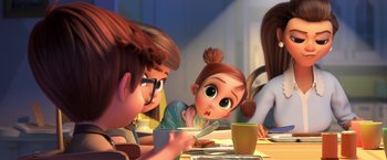 Movie still from “The Boss Baby 2: Family Business” (2021), directed by Tom McGrath – A group of people sitting at a table with food; Close Up shot, Over the shoulder angle