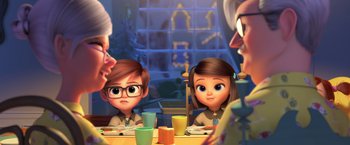 Movie still from “The Boss Baby 2: Family Business” (2021), directed by Tom McGrath – A couple of people sitting at a table with food; Medium shot, Over the shoulder angle