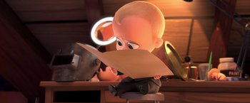 Movie still from “The Boss Baby 2: Family Business” (2021), directed by Tom McGrath – A cartoon character is reading a paper; Medium shot, High angle