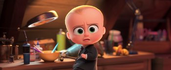 Movie still from “The Boss Baby 2: Family Business” (2021), directed by Tom McGrath – A baby boss is holding a hammer in his hand; Medium shot, High angle