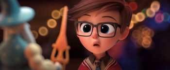 Movie still from “The Boss Baby 2: Family Business” (2021), directed by Tom McGrath – An animated boy wearing glasses looking surprised; Close Up shot, Over the shoulder angle