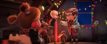 Movie still from “The Boss Baby 2: Family Business” (2021), directed by Tom McGrath – A scene of a scene where a baby is talking to an older man; Wide shot, Over the shoulder angle