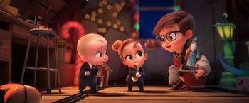 Movie still from “The Boss Baby 2: Family Business” (2021), directed by Tom McGrath – A group of people standing next to each other on top of a wooden table; Medium shot, Over the shoulder angle