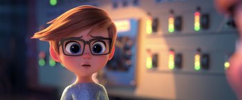 Movie still from “The Boss Baby 2: Family Business” (2021), directed by Tom McGrath – A cartoon of a boy wearing glasses and a blue shirt; Close Up shot, Over the shoulder angle