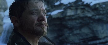 Movie still from “The Bourne Legacy” (2012), directed by Tony Gilroy – A person with a beard; Close Up shot, Low angle