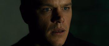 Movie still from “The Bourne Supremacy” (2004), directed by Paul Greengrass – A man's face in the dark; Close Up shot, Low angle
