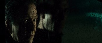 Movie still from “The Bourne Supremacy” (2004), directed by Paul Greengrass – A woman looking out of a car window at night; Close Up shot, Low angle