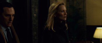 Movie still from “The Bourne Supremacy” (2004), directed by Paul Greengrass – A woman with blonde hair wearing a black jacket; Close Up shot, Over the shoulder angle