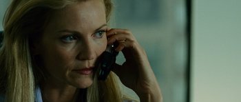 Movie still from “The Bourne Supremacy” (2004), directed by Paul Greengrass – A person talking on a cell phone; Close Up shot, Low angle