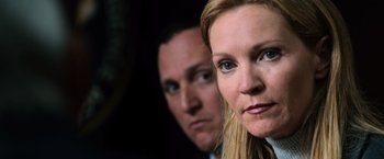 Movie still from “The Bourne Ultimatum” (2007), directed by Paul Greengrass – A man and a woman staring at the camera; Close Up shot, Low angle