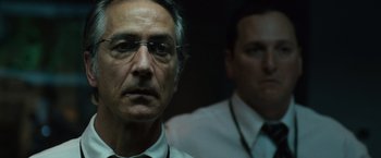 Movie still from “The Bourne Ultimatum” (2007), directed by Paul Greengrass – A man in a white shirt and a man in a white shirt; Close Up shot, Low angle