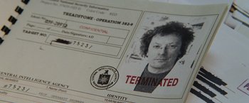 Movie still from “The Bourne Ultimatum” (2007), directed by Paul Greengrass – View of a person's identification card; Extreme Close Up shot, Overhead angle