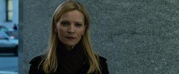 Movie still from “The Bourne Ultimatum” (2007), directed by Paul Greengrass – A woman with blonde hair wearing a black jacket; Close Up shot, Low angle