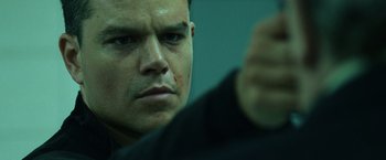 Movie still from “The Bourne Ultimatum” (2007), directed by Paul Greengrass – A man with a bruised face; Close Up shot, Low angle
