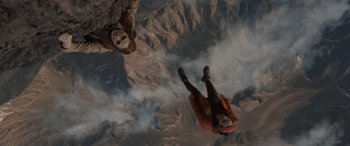 Movie still from “The Bubble” (2022), directed by Judd Apatow – Two people are in the air while parachuting; Extreme Wide shot, Overhead angle