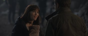 Movie still from “The Bubble” (2022), directed by Judd Apatow – A man and a woman standing next to each other; Close Up shot, Over the shoulder angle