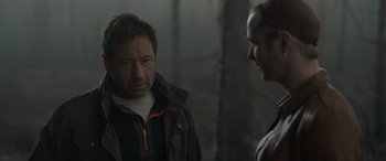 Movie still from “The Bubble” (2022), directed by Judd Apatow – A man and a woman talking to each other; Close Up shot, Over the shoulder angle