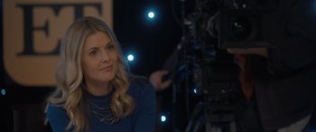Movie still from “The Bubble” (2022), directed by Judd Apatow – A woman sitting in front of a video camera; Close Up shot, Over the shoulder angle