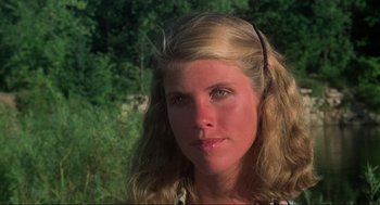 Movie still from “The Burning” (1981), directed by Tony Maylam – A person with long blonde hair; Close Up shot, High angle