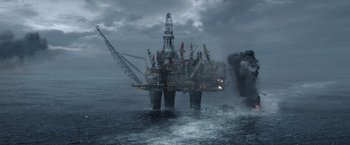 Movie still from “The Burning Sea” (2021), directed by John Andreas Andersen – An oil rig in the middle of the ocean; Extreme Wide shot, High angle