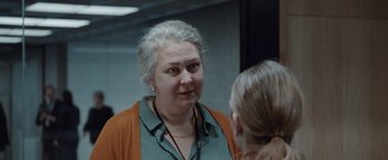 Movie still from “The Burning Sea” (2021), directed by John Andreas Andersen – An older woman talking to a younger woman in front of a mirror; Close Up shot, Over the shoulder angle