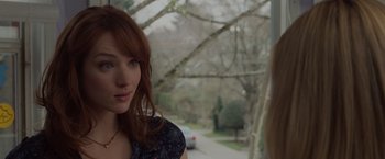 Movie still from “The Cabin in the Woods” (2011), directed by Drew Goddard – A person wearing a floral shirt; Close Up shot, Over the shoulder angle