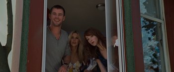 Movie still from “The Cabin in the Woods” (2011), directed by Drew Goddard – A group of people standing next to each other in front of a window; Medium shot, Low angle