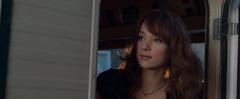 Movie still from “The Cabin in the Woods” (2011), directed by Drew Goddard – A beautiful young lady looking out of a window; Close Up shot, Low angle