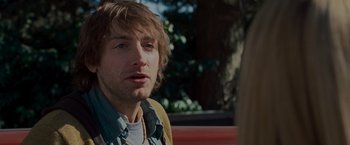 Movie still from “The Cabin in the Woods” (2011), directed by Drew Goddard – A person wearing a jacket; Close Up shot, Over the shoulder angle