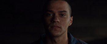 Movie still from “The Cabin in the Woods” (2011), directed by Drew Goddard – A person's face in the dark; Close Up shot, Low angle