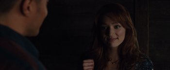 Movie still from “The Cabin in the Woods” (2011), directed by Drew Goddard – A beautiful young lady posing for a picture; Close Up shot, Over the shoulder angle