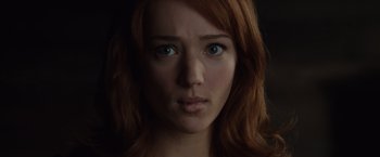 Movie still from “The Cabin in the Woods” (2011), directed by Drew Goddard – A woman's face in the dark; Close Up shot, Low angle