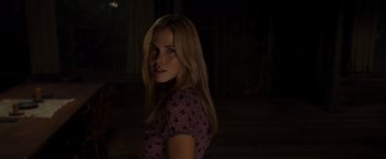 Movie still from “The Cabin in the Woods” (2011), directed by Drew Goddard – A beautiful young blond woman in a floral dress; Medium shot, Over the shoulder angle