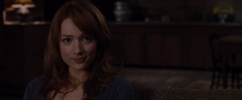Movie still from “The Cabin in the Woods” (2011), directed by Drew Goddard – A person sitting on a couch; Close Up shot, Over the shoulder angle